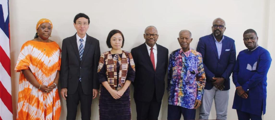 Public Works Minister Hon. Roland L. Giddings (second from right) with some Senior Government Officials and JICA Representatives at the signing ceremony for the construction of a 1.7km road corridor.